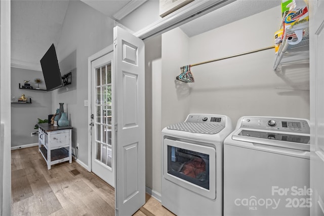 7830 Sarah Dr, Denver, NC 28037 - washroom with washing machine and dryer and light wood-type flooring