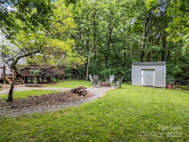 7830 Sarah Dr, Denver, NC 28037 - view of yard featuring an outdoor fire pit and a deck
