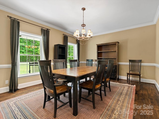 1010 Arabian Farm Rd, Clover, SC 29710 - dining area featuring a chandelier, wood finished floors, crown molding, and baseboards