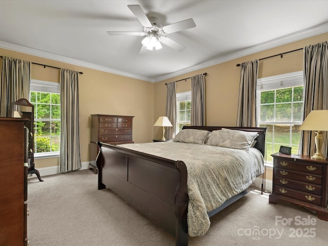 1010 Arabian Farm Rd, Clover, SC 29710 - carpeted bedroom featuring multiple windows, ornamental molding, baseboards, and a ceiling fan