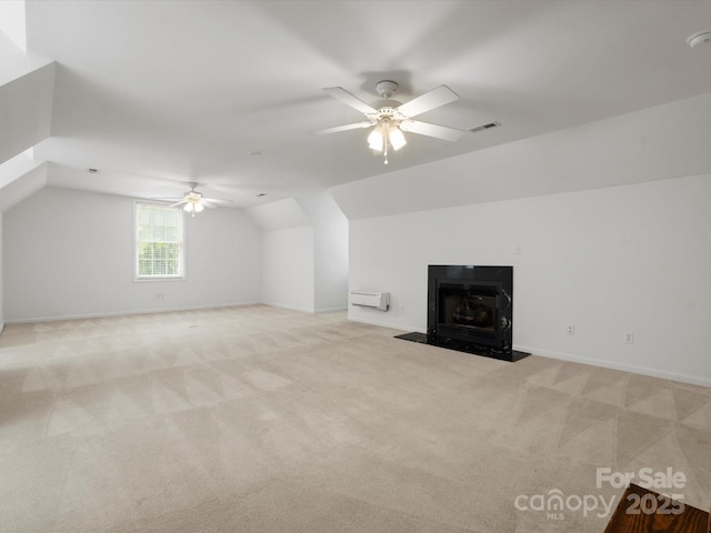 1010 Arabian Farm Rd, Clover, SC 29710 - additional living space with a ceiling fan, light colored carpet, lofted ceiling, baseboards, and a fireplace with flush hearth
