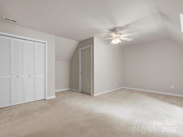 1010 Arabian Farm Rd, Clover, SC 29710 - additional living space with vaulted ceiling, light colored carpet, a ceiling fan, and baseboards