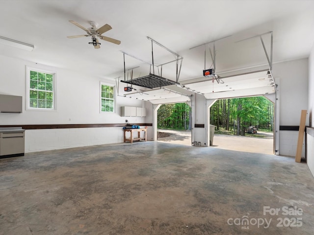 1010 Arabian Farm Rd, Clover, SC 29710 - garage featuring a garage door opener and a ceiling fan