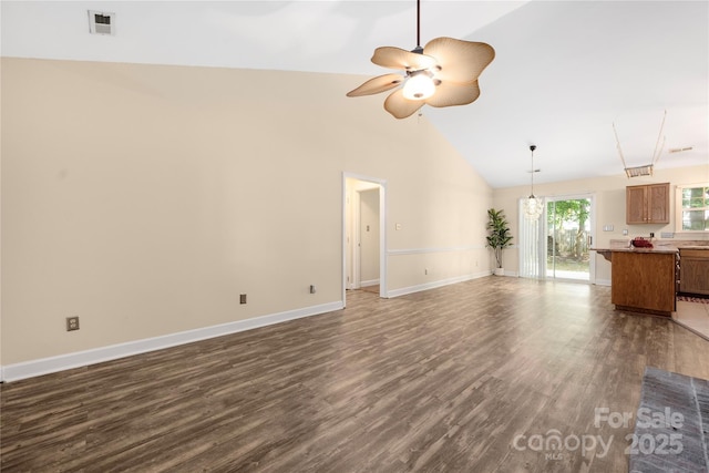 172 Valleybrook Dr Unit 8, Denver, NC 28037 - living room with dark wood-style flooring, high vaulted ceiling, a ceiling fan, and a chandelier
