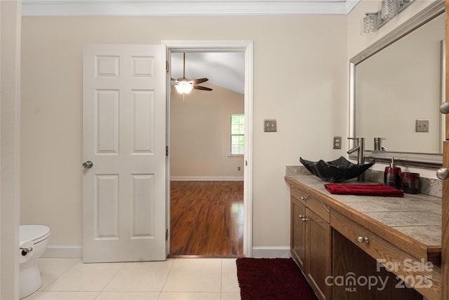 172 Valleybrook Dr Unit 8, Denver, NC 28037 - bathroom with a ceiling fan, vanity, lofted ceiling, tile patterned floors, and ornamental molding