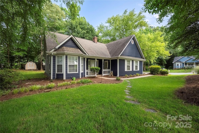 172 Valleybrook Dr Unit 8, Denver, NC 28037 - view of front of property with a porch, a shed, a chimney, and a front lawn