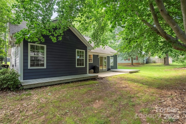 172 Valleybrook Dr Unit 8, Denver, NC 28037 - rear view of house with a yard, a shingled roof, and a wooden deck