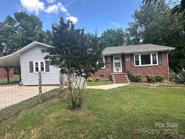 286 Southside Rd, Rock Hill, SC 29730 - view of front of house with a carport, a front lawn, brick siding, and concrete driveway