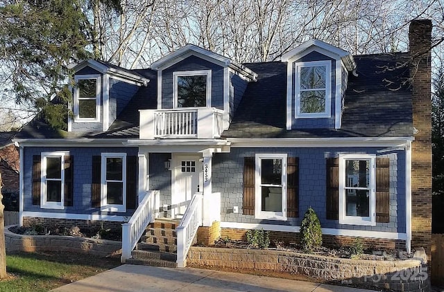 3453 Selwyn Ave, Charlotte, NC 28209 - view of front of home featuring a balcony and a chimney
