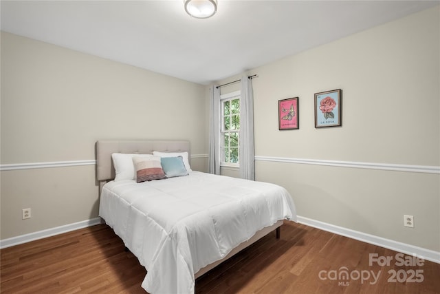 5016 Celeste Ct, Charlotte, NC 28270 - bedroom with baseboards and wood finished floors