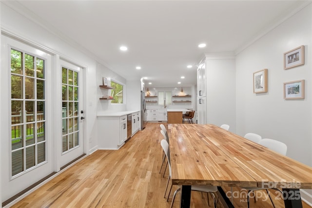 5016 Celeste Ct, Charlotte, NC 28270 - dining space with crown molding, light wood-type flooring, and recessed lighting