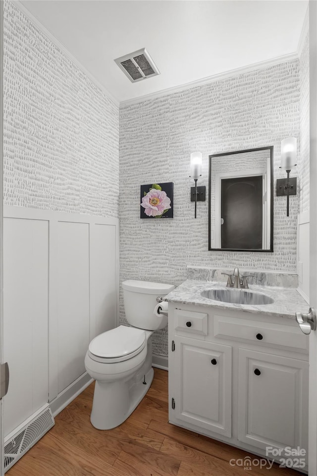 5016 Celeste Ct, Charlotte, NC 28270 - half bathroom with vanity, toilet, and wood finished floors