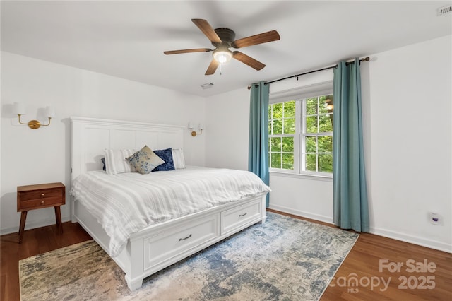 5016 Celeste Ct, Charlotte, NC 28270 - bedroom featuring wood finished floors, baseboards, and ceiling fan