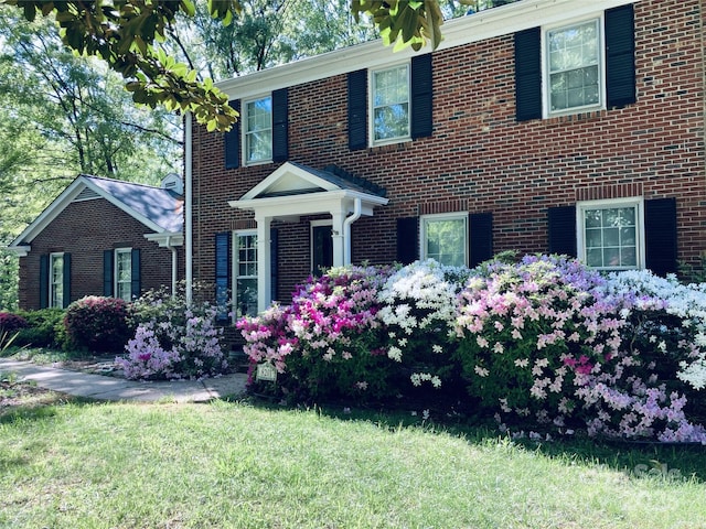 8201 Lansford Rd, Charlotte, NC 28277 - view of front facade featuring a front lawn and brick siding