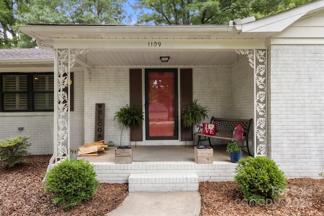 1109 S Highland Ave, Landis, NC 28088 - doorway to property with brick siding and covered porch