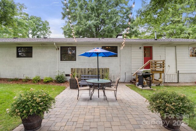 1109 S Highland Ave, Landis, NC 28088 - view of patio / terrace featuring area for grilling and outdoor dining space