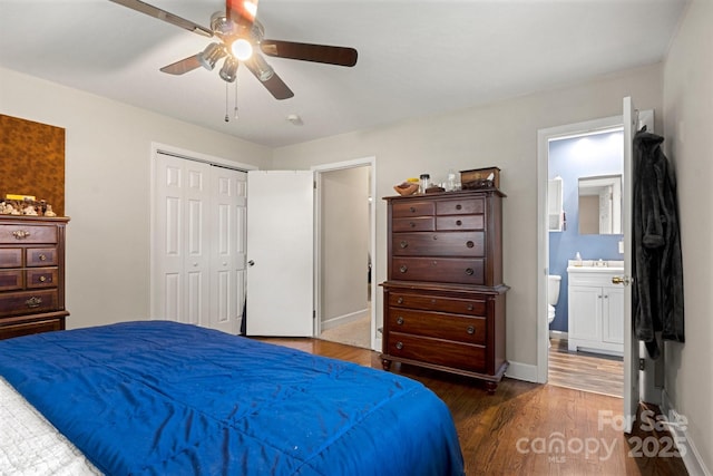 1109 S Highland Ave, Landis, NC 28088 - bedroom with wood finished floors, a closet, baseboards, ceiling fan, and ensuite bathroom