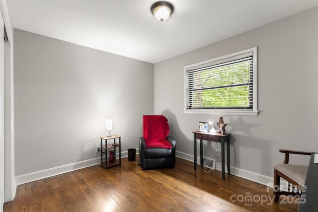 1109 S Highland Ave, Landis, NC 28088 - living area with baseboards and wood finished floors