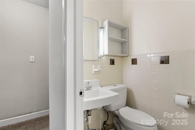 1109 S Highland Ave, Landis, NC 28088 - half bath with tile walls, toilet, and a sink