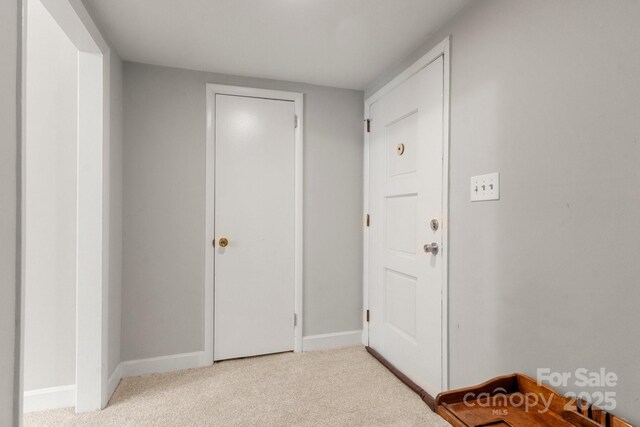 1109 S Highland Ave, Landis, NC 28088 - foyer entrance with light colored carpet and baseboards
