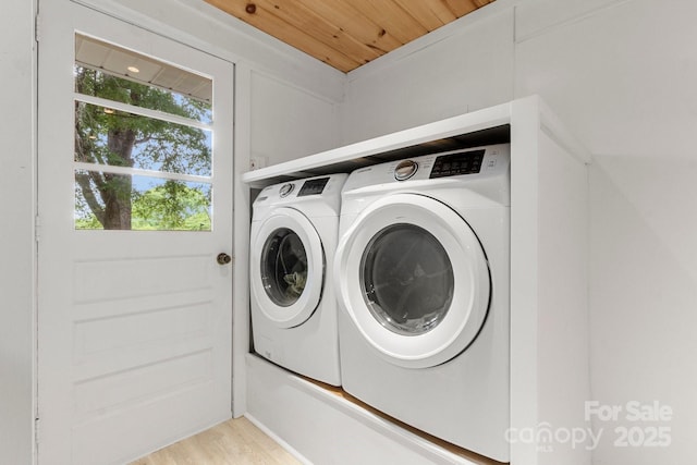 1109 S Highland Ave, Landis, NC 28088 - laundry room with washing machine and clothes dryer, light wood-style flooring, and wooden ceiling
