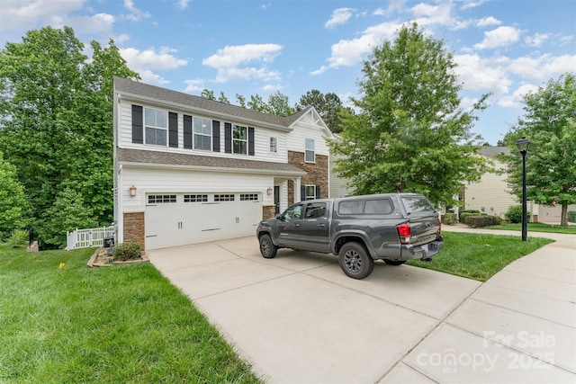 6726 Carradale Way, Charlotte, NC 28278 - view of front of home with driveway, a front yard, stone siding, and a garage