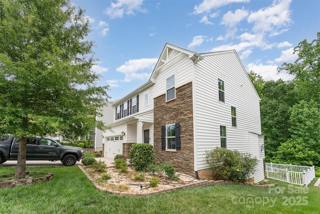 6726 Carradale Way, Charlotte, NC 28278 - view of property exterior featuring stone siding and a garage