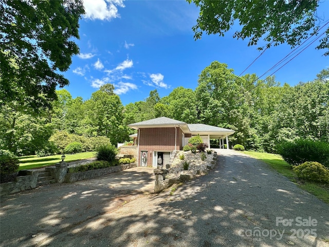 2866 Old Morganton Rd, Lenoir, NC 28645 - view of front facade with brick siding and asphalt driveway