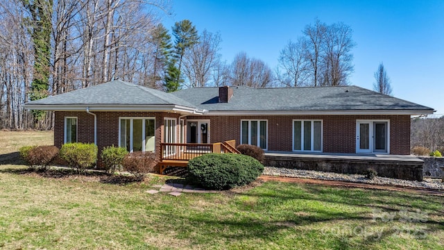 2866 Old Morganton Rd, Lenoir, NC 28645 - rear view of property with a yard, brick siding, a chimney, and roof with shingles