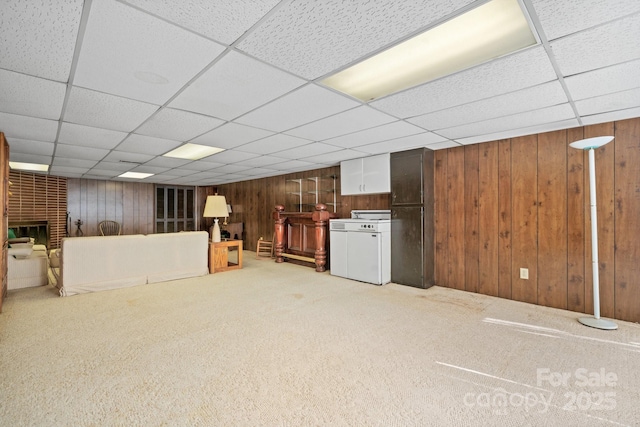 2866 Old Morganton Rd, Lenoir, NC 28645 - finished below grade area featuring wood walls, a drop ceiling, carpet, and a fireplace