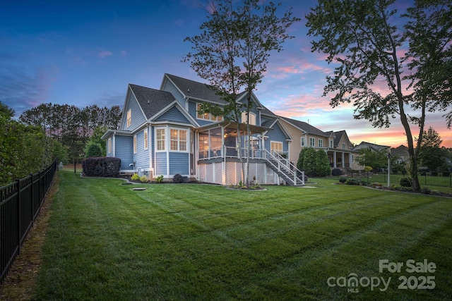 118 Tuscany Trl, Mooresville, NC 28117 - back of property featuring a sunroom, stairs, and a shingled roof