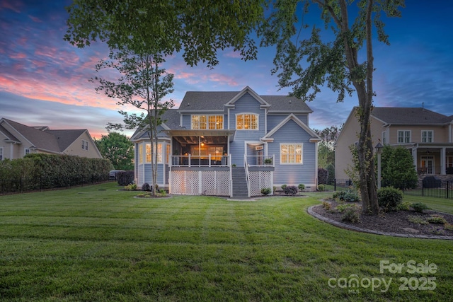 118 Tuscany Trl, Mooresville, NC 28117 - back of property with a sunroom and a lawn