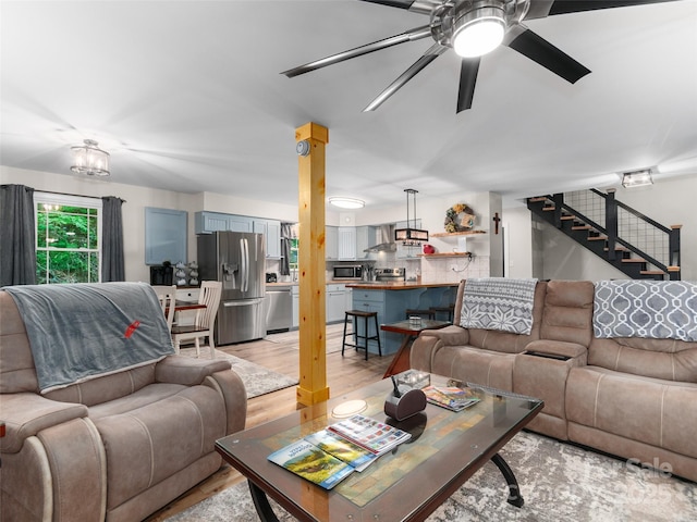 306 Mashstomp Rd, Maggie Valley, NC 28751 - living area with ceiling fan, stairs, and light wood-style flooring