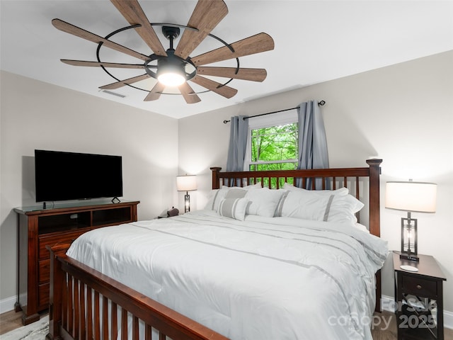 306 Mashstomp Rd, Maggie Valley, NC 28751 - bedroom featuring baseboards and a ceiling fan