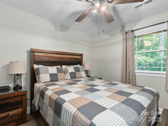 306 Mashstomp Rd, Maggie Valley, NC 28751 - bedroom with baseboards and ceiling fan