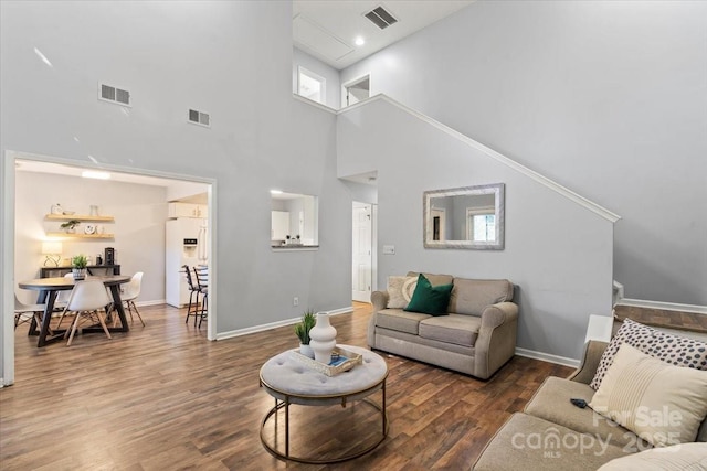 1410 Swaying Branch Ln, Clover, SC 29710 - living room featuring a high ceiling, wood finished floors, and baseboards