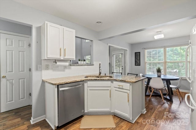 1410 Swaying Branch Ln, Clover, SC 29710 - kitchen featuring dishwasher, a sink, white cabinetry, tasteful backsplash, and light stone countertops