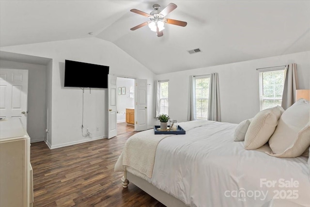 1410 Swaying Branch Ln, Clover, SC 29710 - bedroom with lofted ceiling, dark wood-style flooring, baseboards, ceiling fan, and ensuite bath
