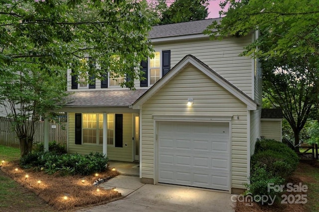 1410 Swaying Branch Ln, Clover, SC 29710 - traditional-style house with a shingled roof, driveway, and an attached garage