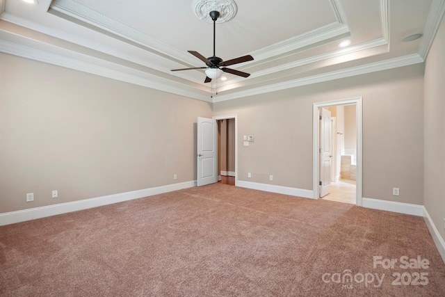 100 Woodwinds Dr, Mount Holly, NC 28120 - unfurnished bedroom with a tray ceiling, ornamental molding, light carpet, baseboards, and recessed lighting