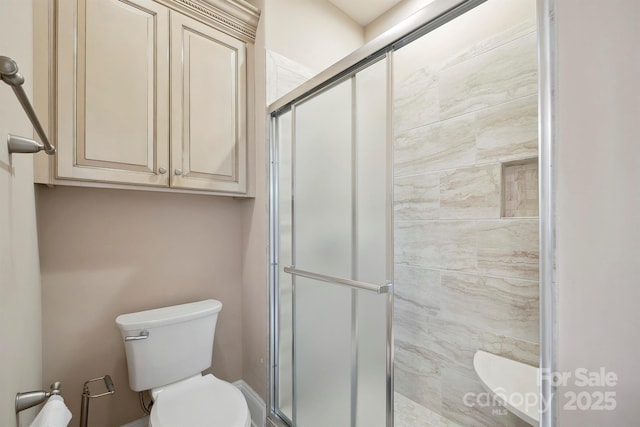100 Woodwinds Dr, Mount Holly, NC 28120 - bathroom featuring toilet and a stall shower