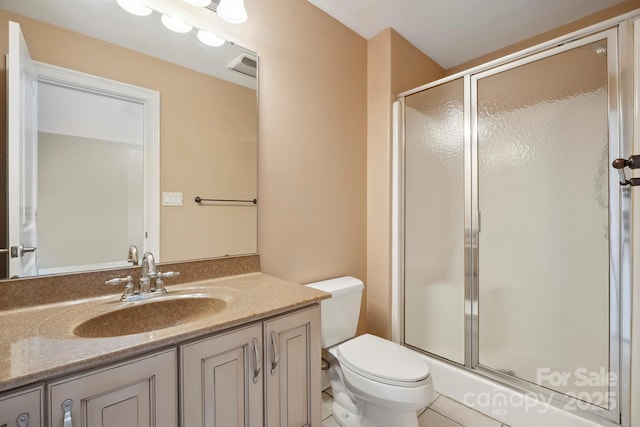 100 Woodwinds Dr, Mount Holly, NC 28120 - full bathroom featuring a stall shower, toilet, and vanity