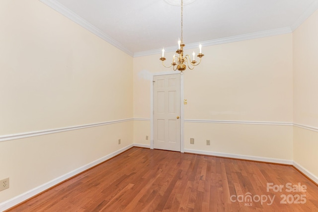 1750 Trellis Dr, Rock Hill, SC 29732 - empty room with a chandelier, crown molding, wood finished floors, and baseboards