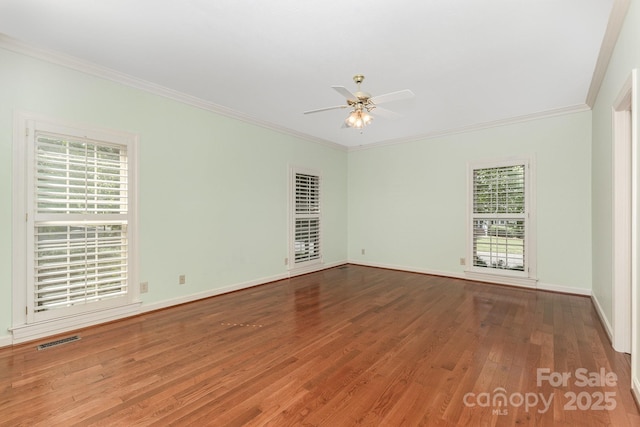 1750 Trellis Dr, Rock Hill, SC 29732 - spare room with healthy amount of natural light, a ceiling fan, wood finished floors, crown molding, and baseboards