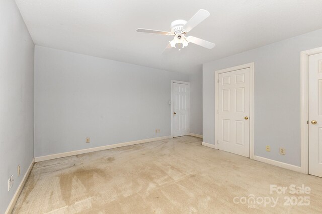 1750 Trellis Dr, Rock Hill, SC 29732 - unfurnished bedroom featuring carpet flooring, baseboards, and a ceiling fan
