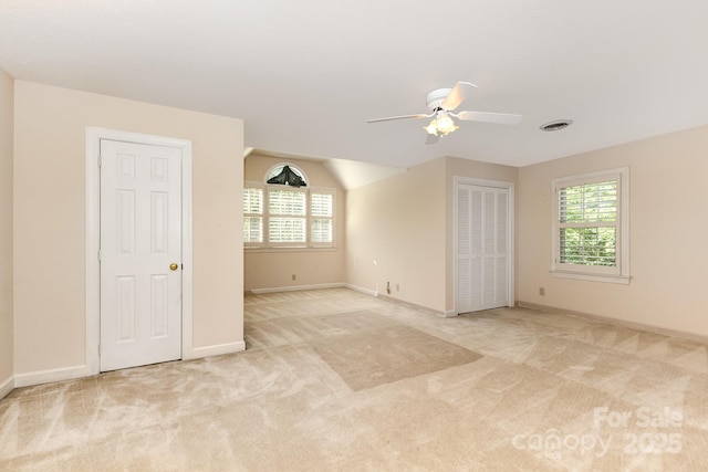 1750 Trellis Dr, Rock Hill, SC 29732 - empty room with carpet floors, a ceiling fan, and plenty of natural light