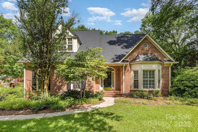 1750 Trellis Dr, Rock Hill, SC 29732 - view of front of property featuring brick siding, a front lawn, and roof with shingles