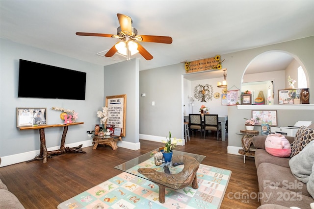 2217 Tate St, Charlotte, NC 28216 - living room with ceiling fan, wood finished floors, arched walkways, and baseboards