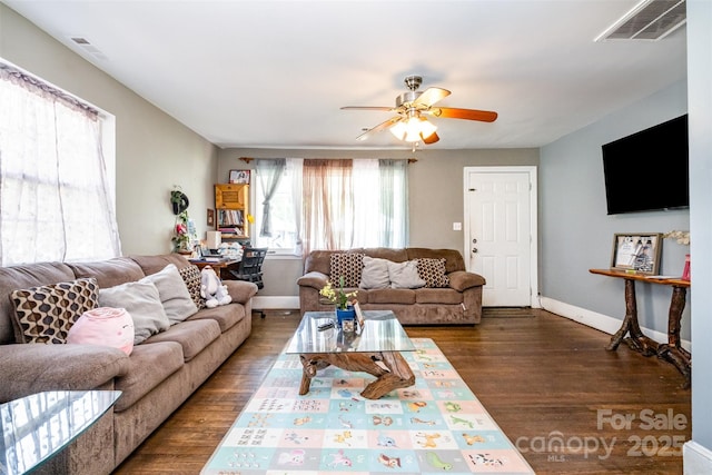 2217 Tate St, Charlotte, NC 28216 - living room featuring wood finished floors, ceiling fan, and baseboards