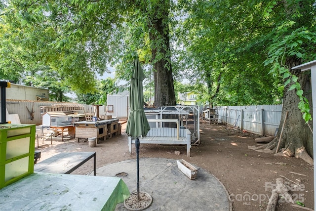 2217 Tate St, Charlotte, NC 28216 - fenced backyard featuring a patio